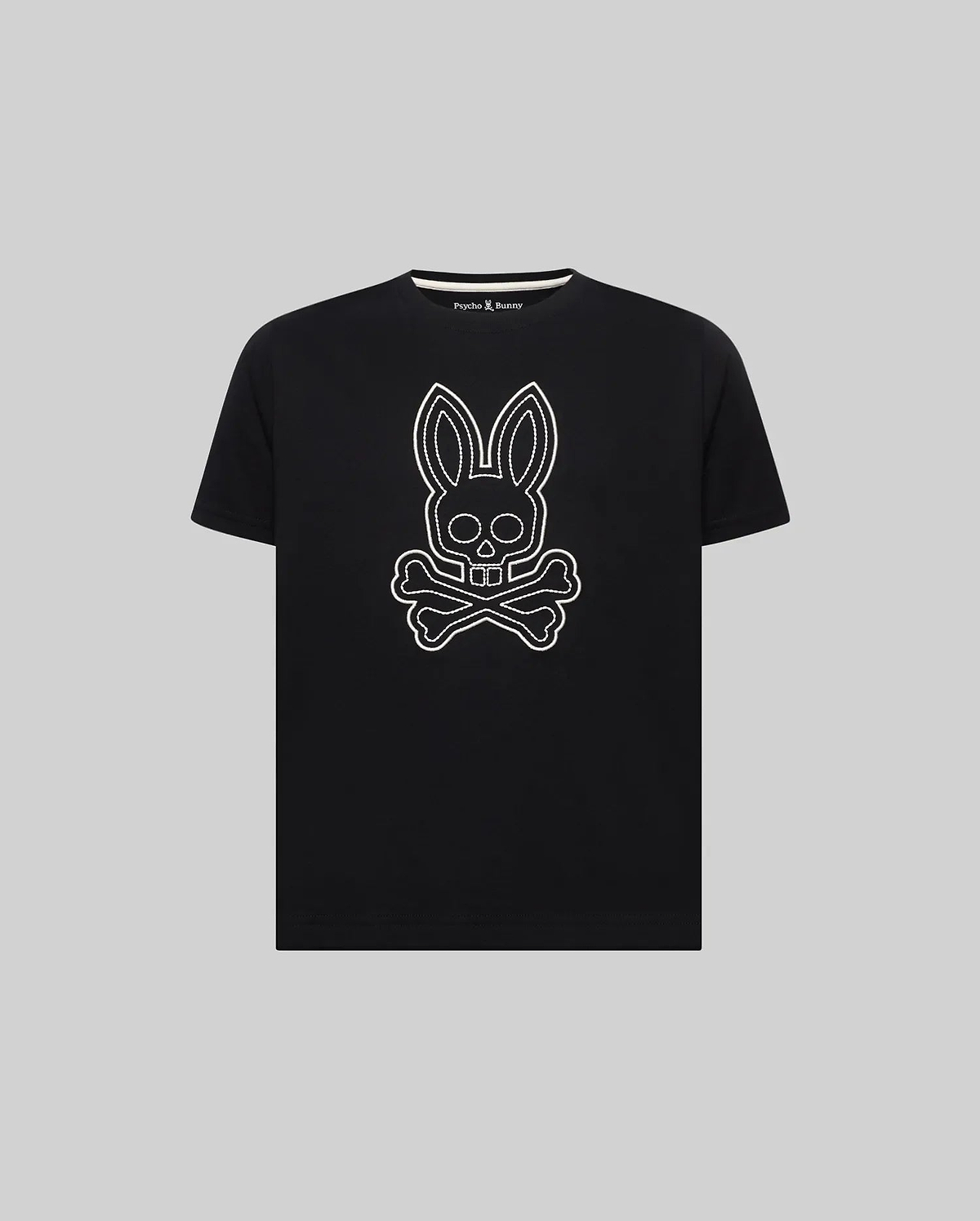 Kids Marcel Graphic Tee, black classic fit jersey tee with a large white outline bunny skull graphic on the chest and a small Psycho Bunny logo on the inner neck.