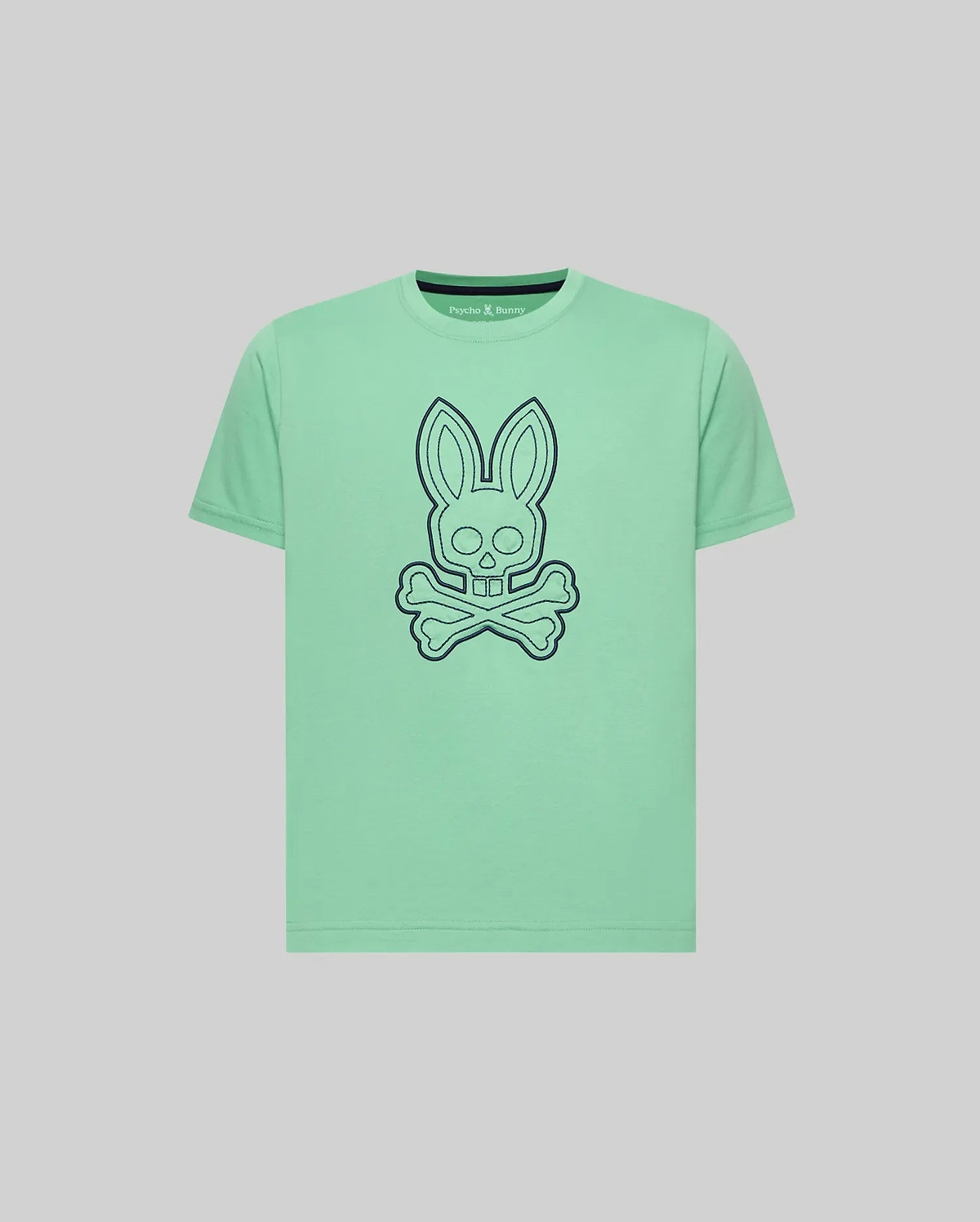 Kids Marcel Graphic Tee in mint green jersey, featuring a large dark blue outline bunny skull and crossbones graphic on the chest, small embroidered Psycho Bunny text logo on upper left, classic fit. (1)