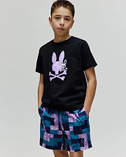 Black Kids Van Graphic Tee, classic fit jersey, with a large pixelated purple and white Psycho Bunny skull chest graphic. Paired with multi-color checkered woven shorts featuring integrated bunny logos. (2)