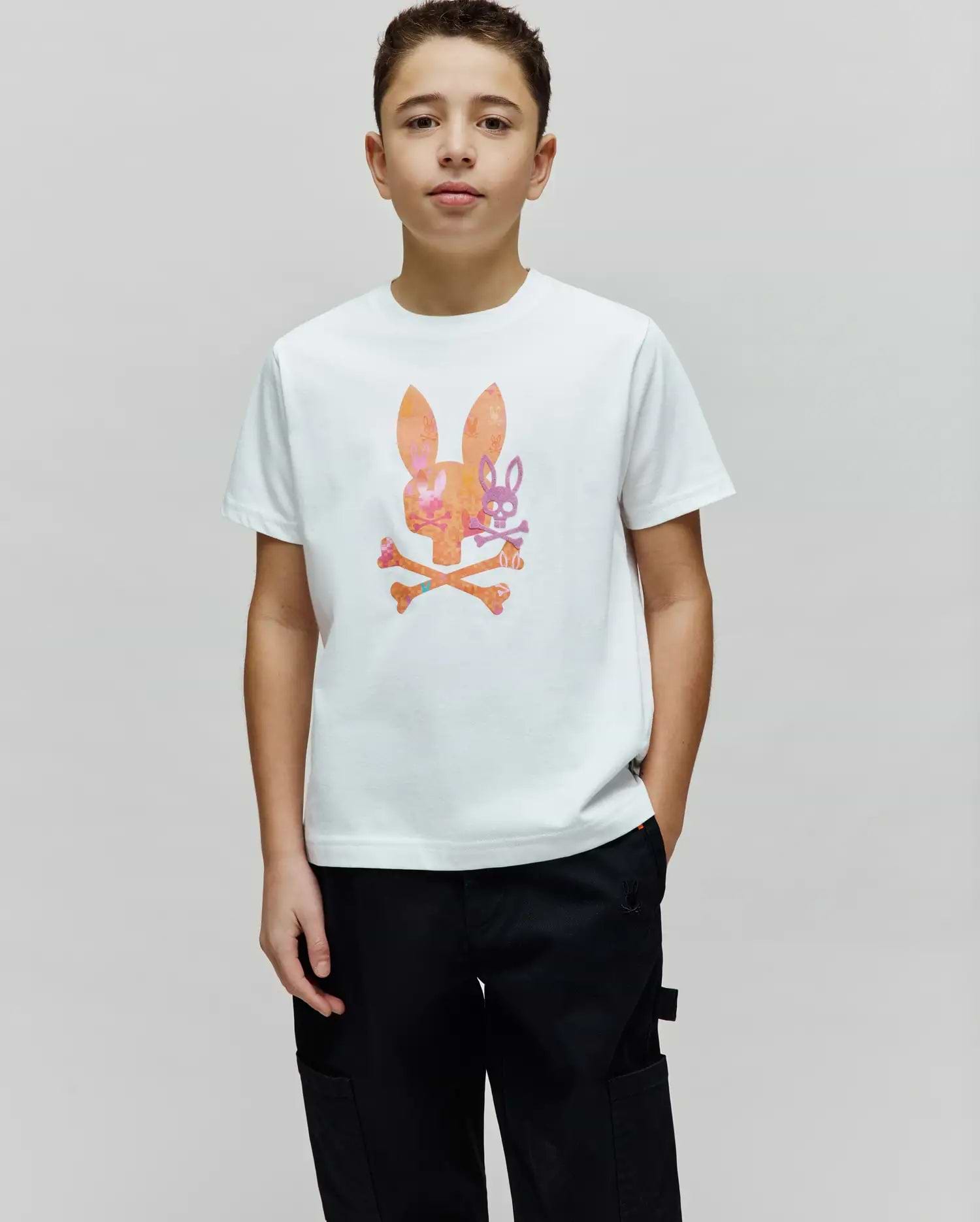 Kids Van Graphic Tee: White classic fit jersey t-shirt featuring a large center chest graphic of an orange and pink patterned bunny skull with a smaller purple bunny skull and crossed bones. (2)