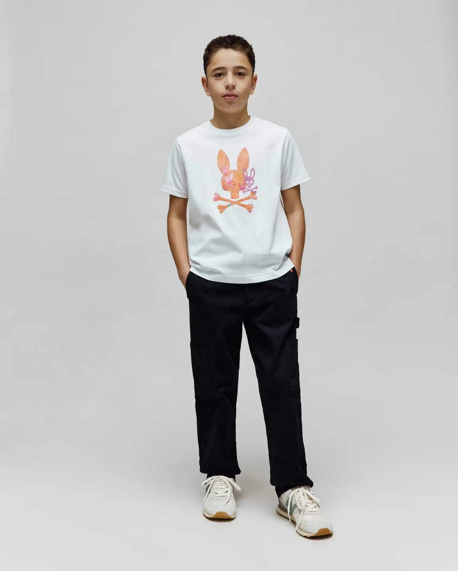 White Kids Van Graphic Tee in classic fit, featuring a large orange, pink, and purple watercolor-style Psycho Bunny skull logo with a subtle van pattern and crossed bones on the chest, made from soft jersey fabric. (4)