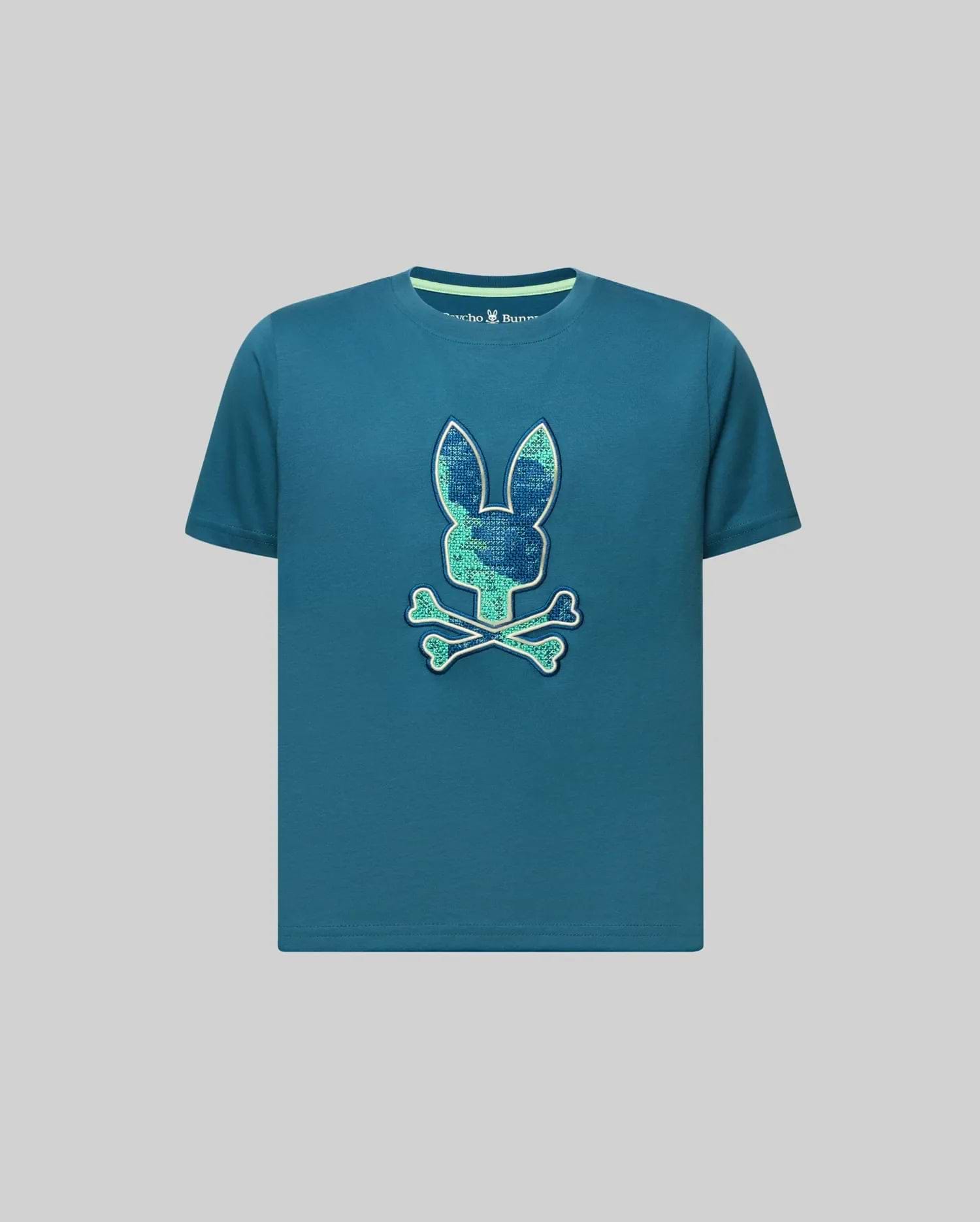 Kids Olivier Graphic Tee, a classic fit teal jersey knit t-shirt featuring a large, centered, textured green and light blue Psycho Bunny skull graphic with a white outline and a ribbed collar with a light green stripe. (1)
