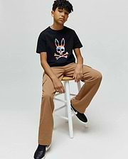 Kids Raphael Graphic Tee in black jersey, featuring a classic fit and a large, vibrant multicolor graphic Psycho Bunny skull and crossbones logo on the center chest. (2)
