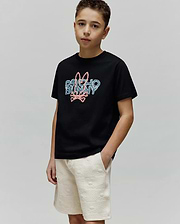 Kids Herman Graphic Tee, black classic fit jersey t-shirt with a large pixelated pink and blue Psycho Bunny logo featuring the iconic bunny skull on the center chest.