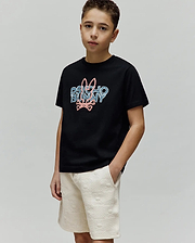 Kids Herman Graphic Tee, black classic fit jersey t-shirt with a large pixelated pink and blue Psycho Bunny logo featuring the iconic bunny skull on the center chest.
