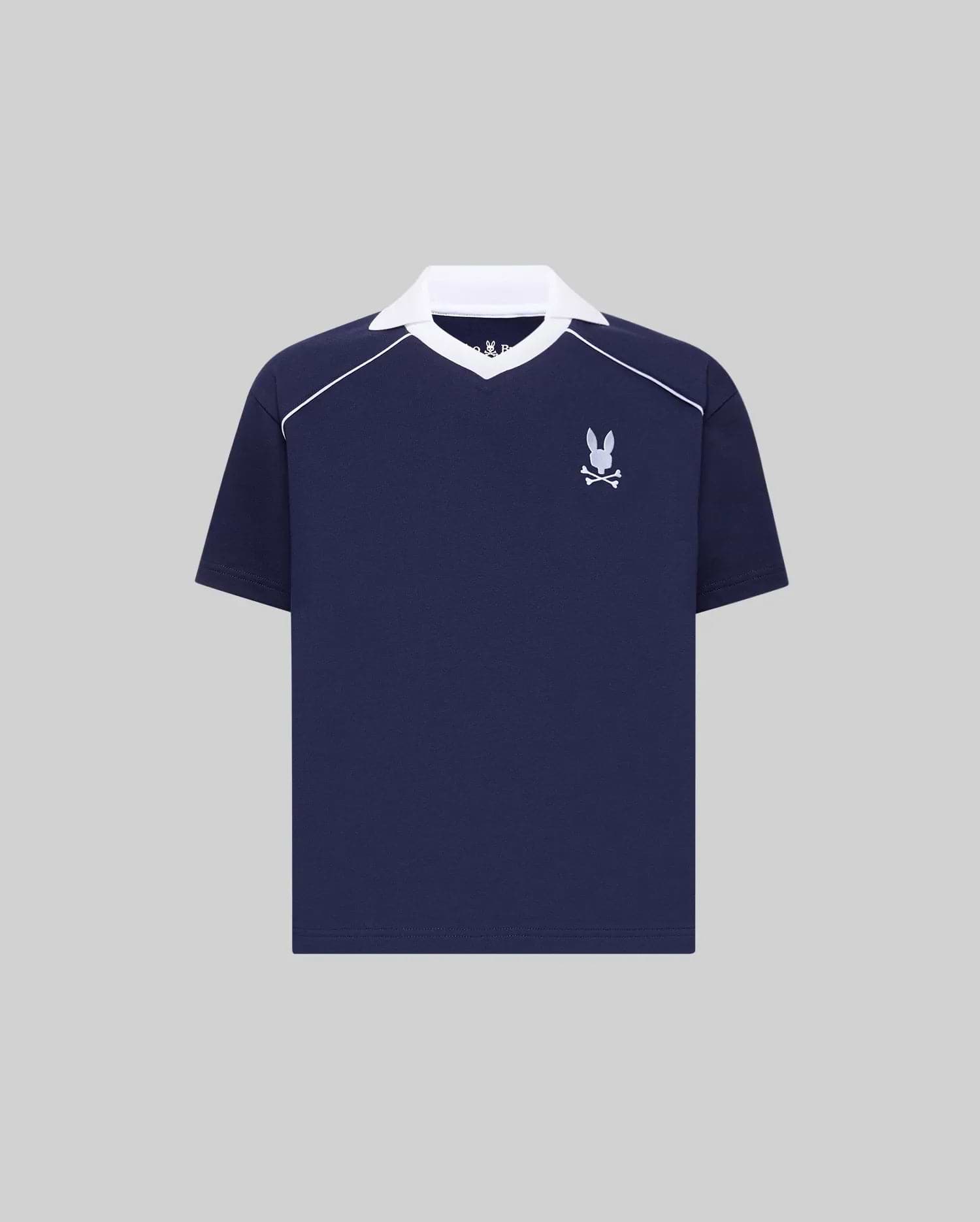 Kids Toby Jersey in navy blue, featuring a white spread collar, white shoulder piping, and an embroidered white Psycho Bunny skull logo on the left chest. Relaxed fit jersey knit.