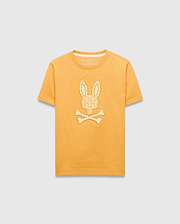 Kids Brad Graphic Tee in golden yellow jersey knit, featuring a large central off-white Psycho Bunny skull logo graphic filled with a subtle repeating bunny pattern, classic fit.