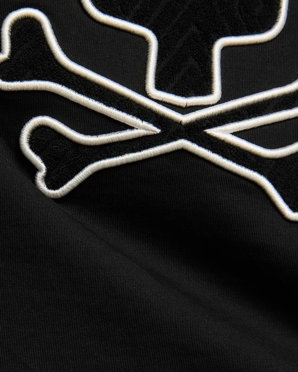 Kids Craig Graphic Tee in black jersey knit, featuring a large bunny skull logo with white embroidered outline and black terry cloth fill. (5)