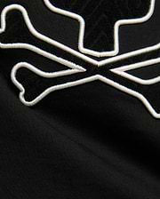 Kids Craig Graphic Tee in black jersey knit, featuring a large bunny skull logo with white embroidered outline and black terry cloth fill. (5)