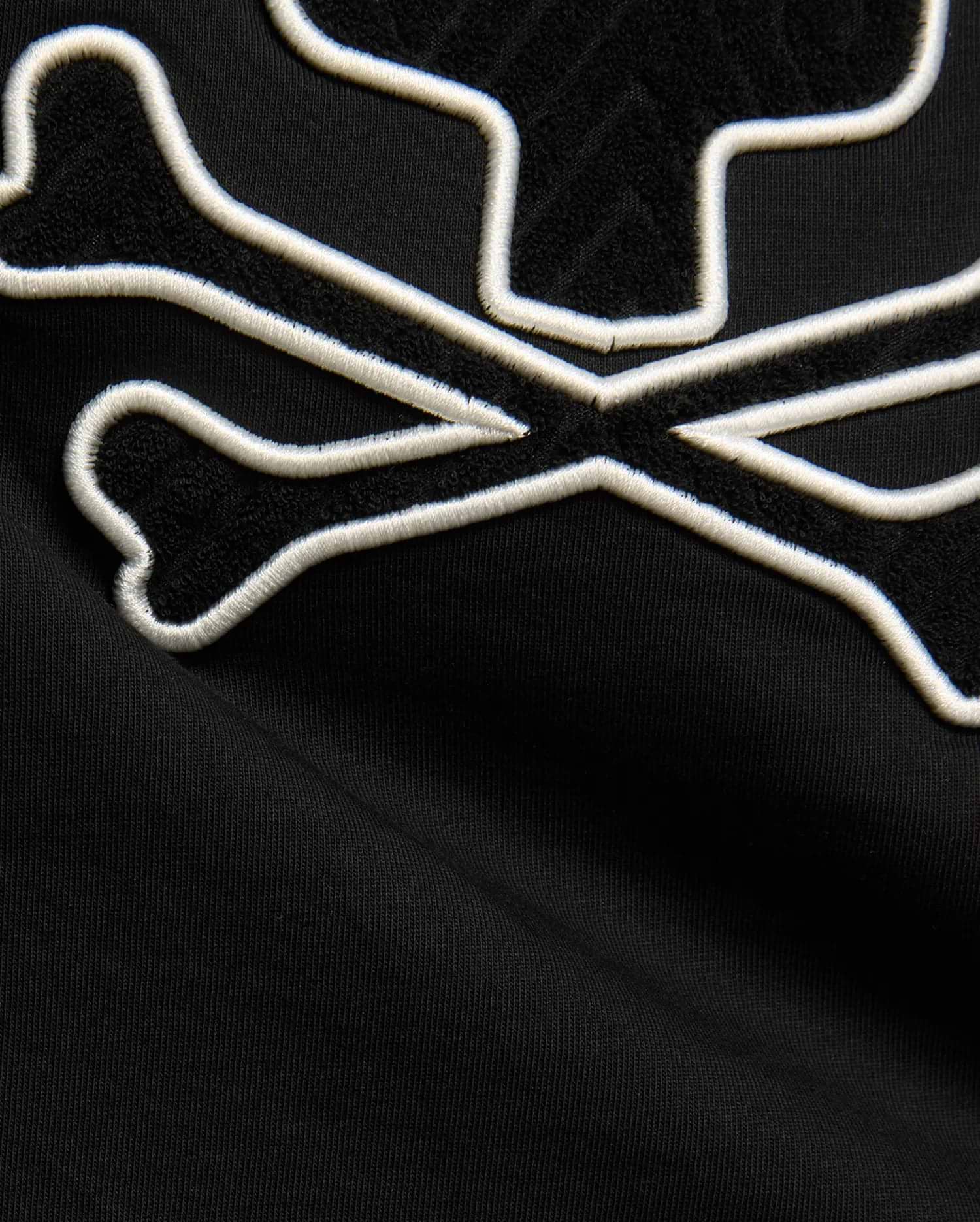 Kids Craig Graphic Tee in black jersey knit, featuring a large bunny skull logo with white embroidered outline and black terry cloth fill. (5)