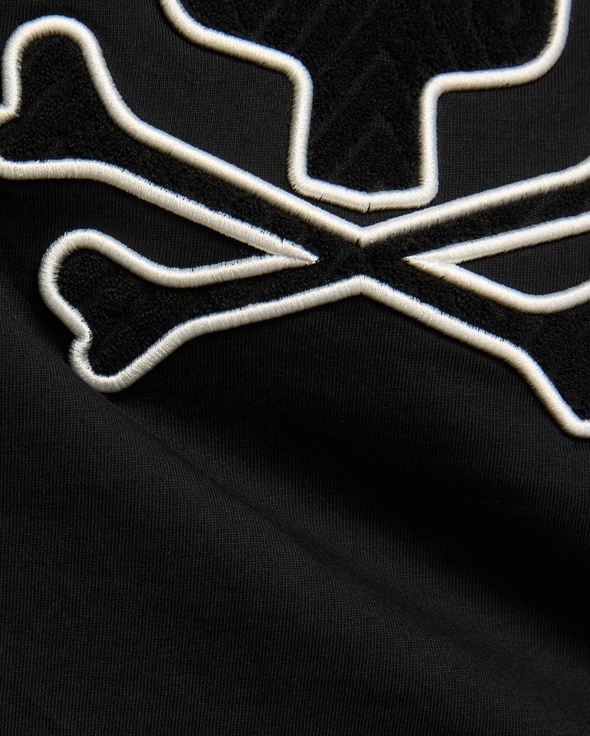 Kids Craig Graphic Tee in black jersey knit, featuring a large bunny skull logo with white embroidered outline and black terry cloth fill. (5)