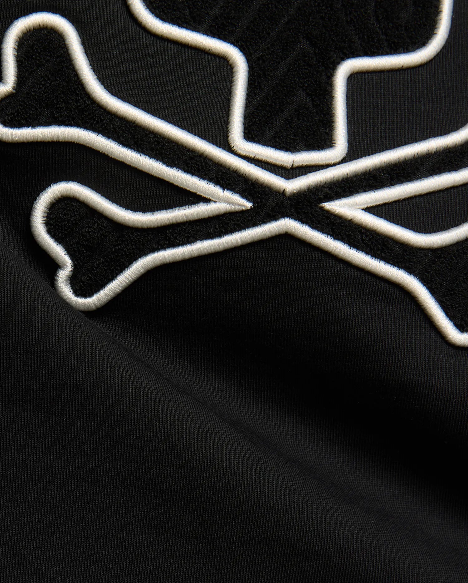 Kids Craig Graphic Tee in black jersey knit, featuring a large bunny skull logo with white embroidered outline and black terry cloth fill. (5)