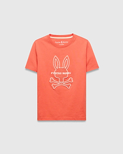 Kids Craig Graphic Tee, a classic fit coral jersey knit t-shirt featuring a large white embroidered Psycho Bunny skull and crossbones logo with PSYCHO BUNNY text on the chest.