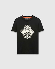 Kids Tobias Graphic Tee, black classic fit jersey t-shirt with a large central white bunny skull and crossbones graphic inside a diamond, flanked by Psycho Bunny text, and an orange inner neckline trim.