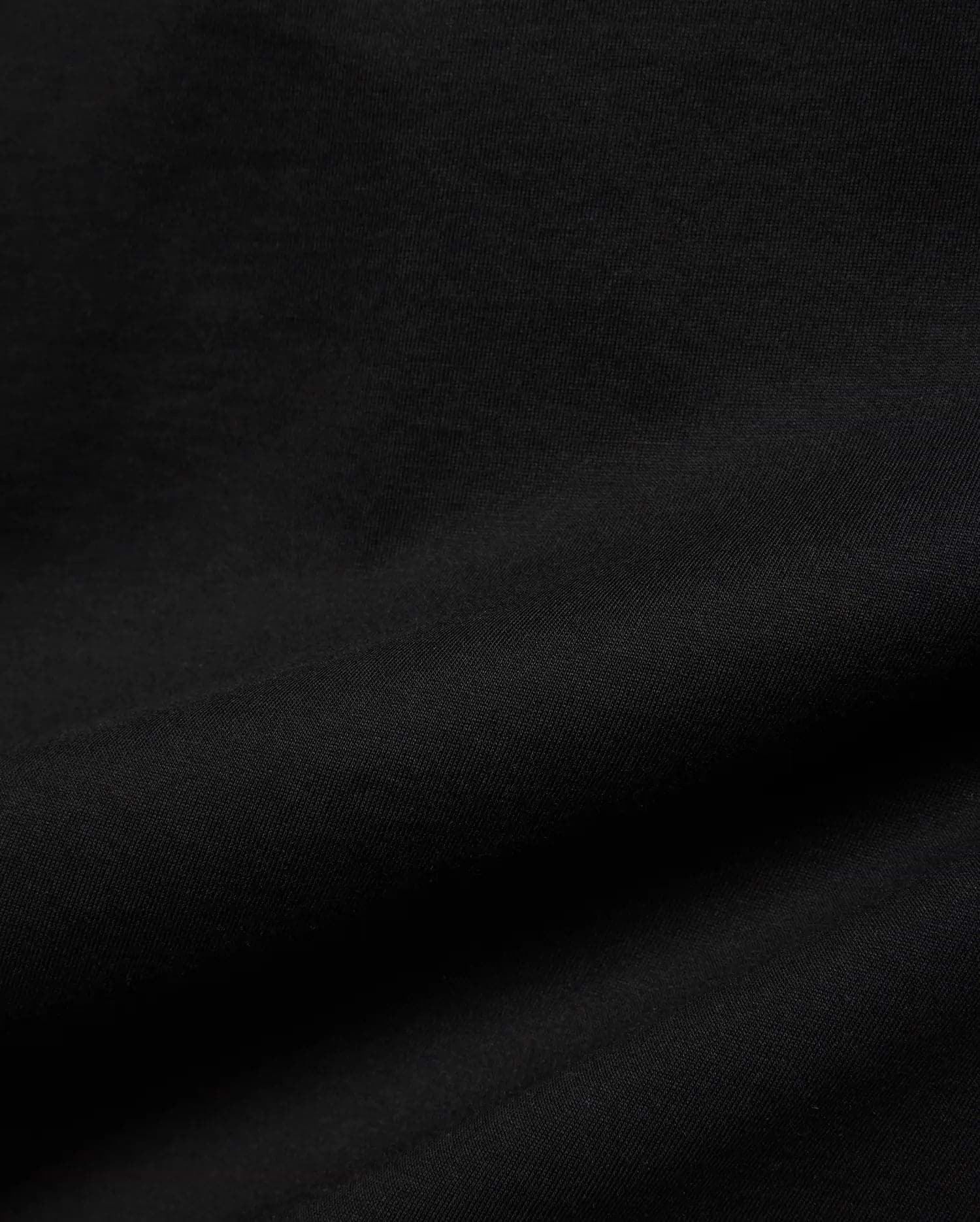 Kids Isaac Relaxed Fit Tee in deep black, crafted from a premium, soft jersey knit fabric with a subtle, comfortable texture, perfect for refined streetwear style.