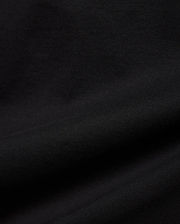 Kids Isaac Relaxed Fit Tee in deep black, crafted from a premium, soft jersey knit fabric with a subtle, comfortable texture, perfect for refined streetwear style.