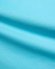 Kids Isaac Relaxed Fit Tee in vibrant aqua blue, crafted from soft jersey knit fabric, featuring the iconic small embroidered Psycho Bunny skull logo on the chest.