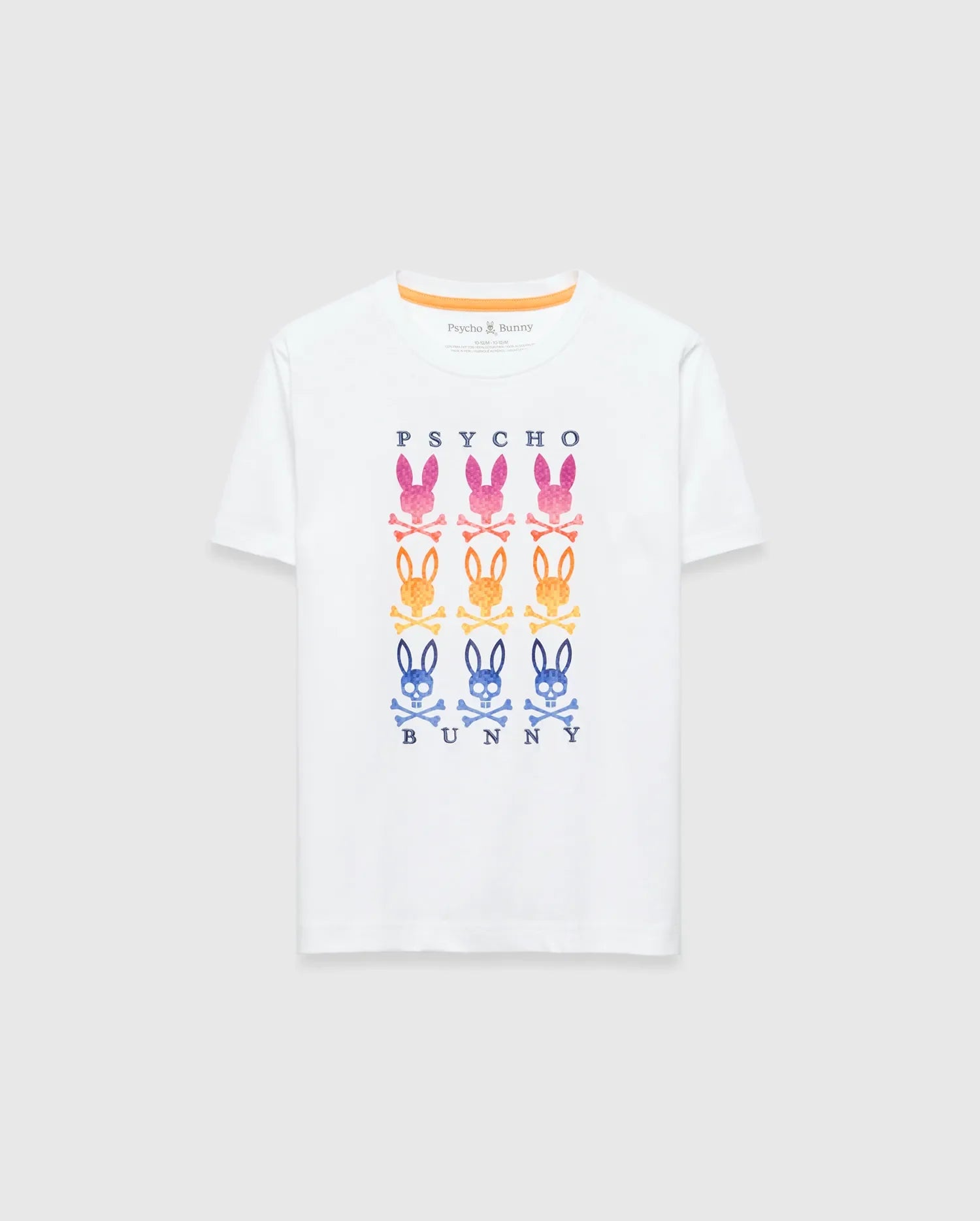 Kids Colt Graphic Tee, white classic fit jersey t-shirt featuring a large chest graphic of PSYCHO BUNNY text with rows of pink, orange, and blue gradient bunny skull logos, finished with an orange neck tape.