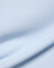 Light blue Kids Taylor Pique Tee, premium breathable pique fabric with a subtle textured weave, featuring the iconic small embroidered Psycho Bunny skull logo on the left chest, for refined streetwear.