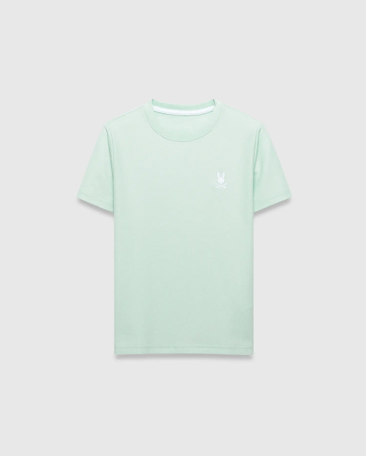 Kids Taylor Pique Tee in a fresh mint green, crafted from a textured pique knit for a classic fit. It features a small, crisp white embroidered Psycho Bunny skull logo on the left chest and subtle white inner neck tape branding.