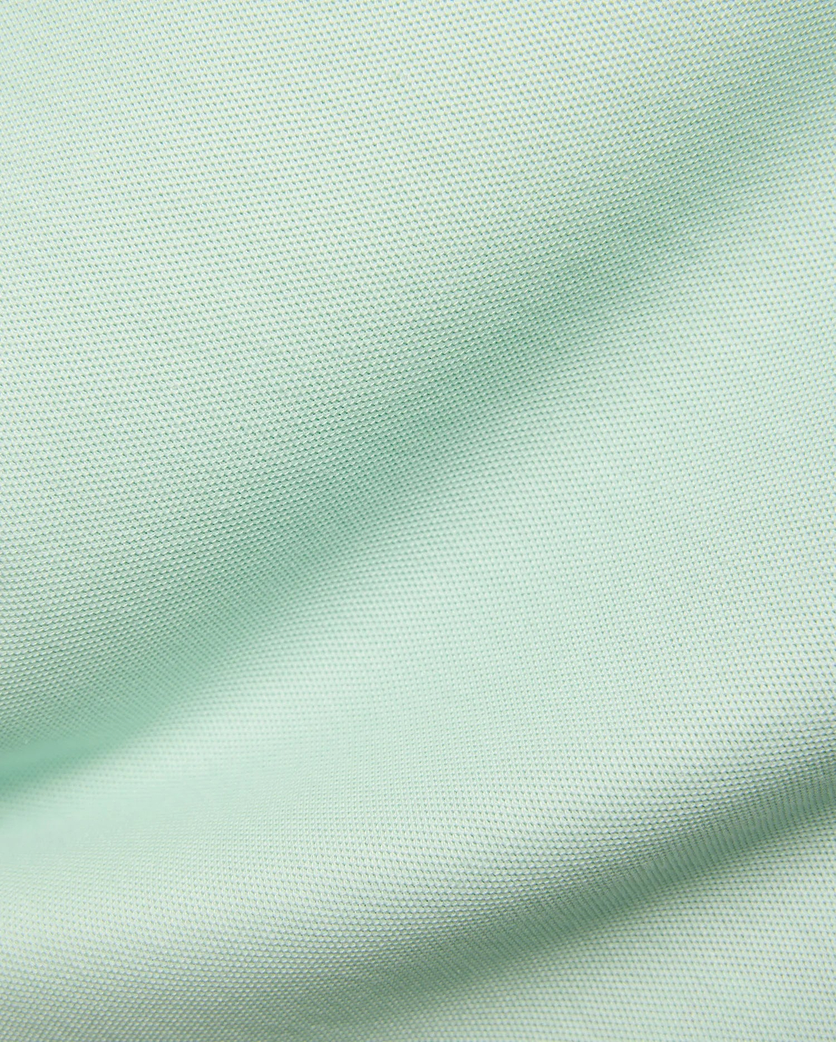 Kids Taylor Pique Tee in a vibrant yet soft pale mint green, featuring a premium, breathable pique knit texture, characteristic of Psycho Bunny's refined streetwear.