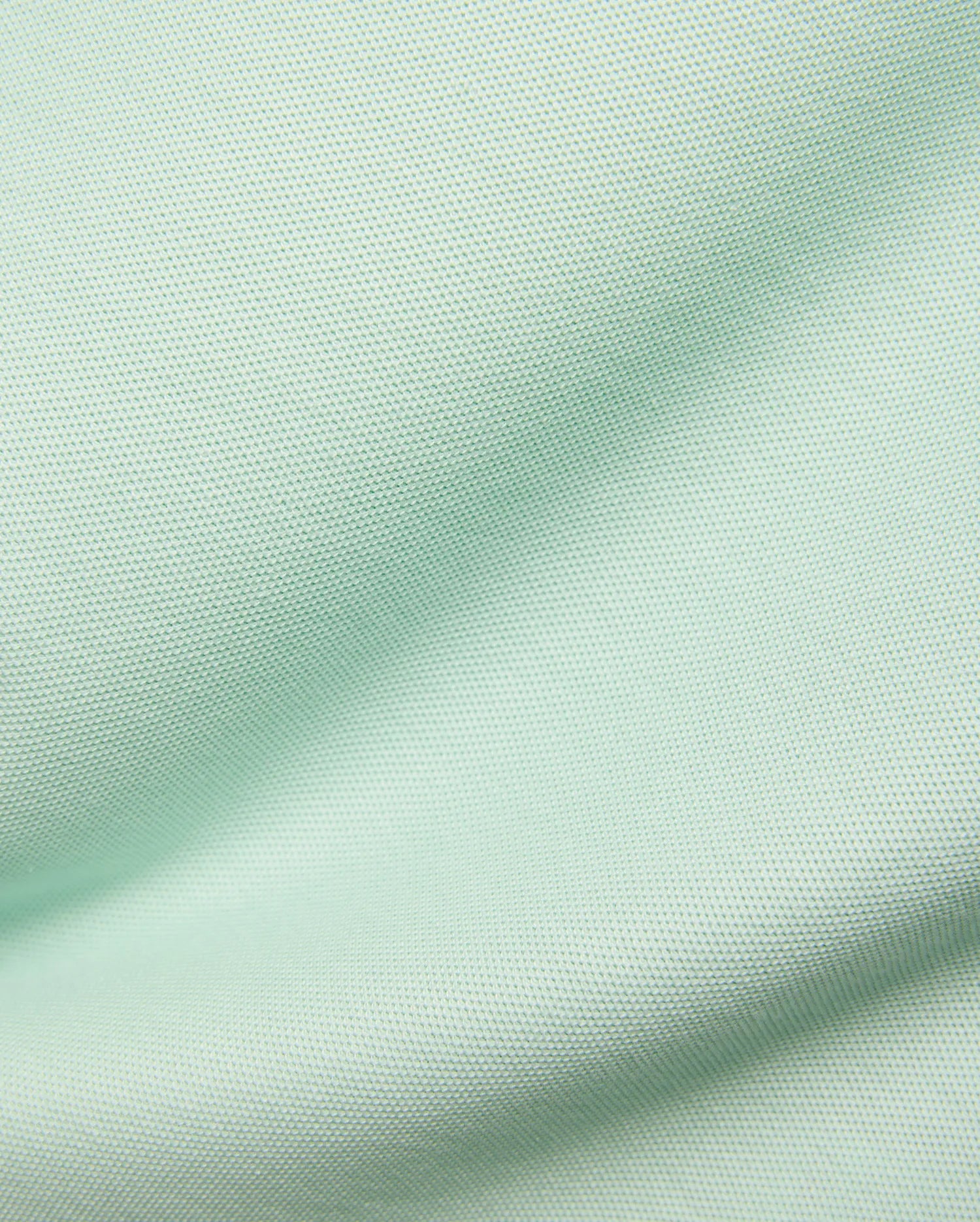 Kids Taylor Pique Tee in a vibrant yet soft pale mint green, featuring a premium, breathable pique knit texture, characteristic of Psycho Bunny's refined streetwear.