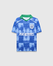 Kids Micah Oversized Soccer Jersey, blue distressed checkerboard with green collar, white V-neck trim, and shoulder stripes. Chest has a Psycho Bunny Football Club patch and Psycho Bunny text.