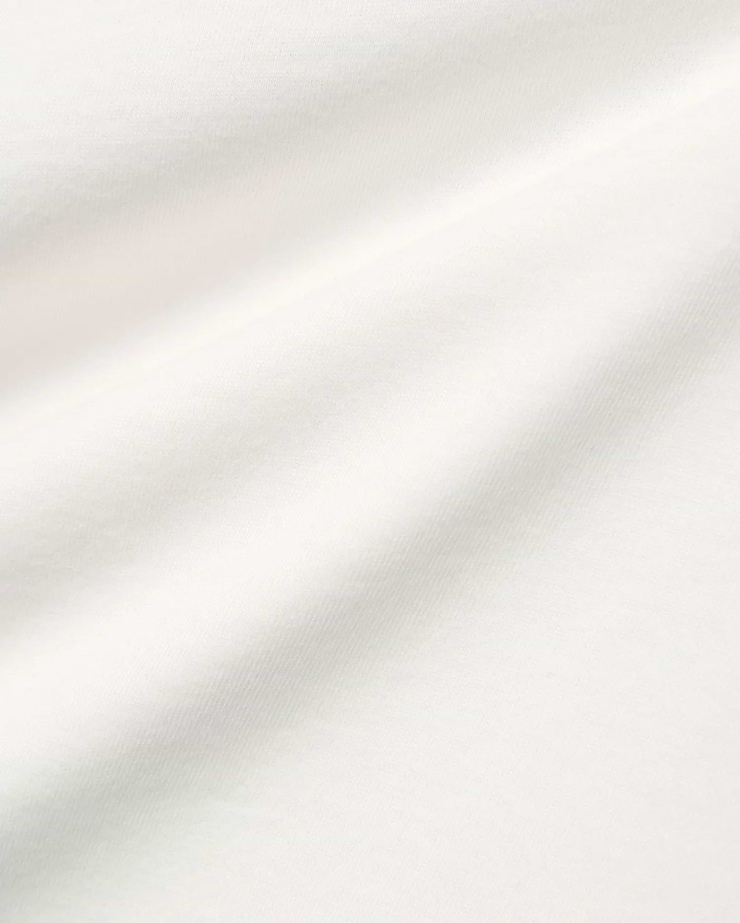 White Kids Alex Relaxed Back Graphic Tee, a soft jersey knit with subtle texture, featuring the iconic Psycho Bunny skull logo on the chest and a bold back graphic.
