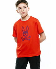 Kids Stan Graphic Tee in vibrant orange jersey knit, featuring a classic fit and a large central chest graphic of the iconic Psycho Bunny skull and crossbones logo in textured purple and blue.