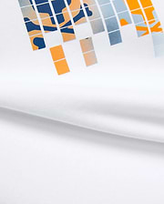 Kids Zander Graphic Tee, white jersey t-shirt with a large, bold pixelated chest graphic in navy, orange, and light blue, featuring abstract shapes for a modern streetwear look.