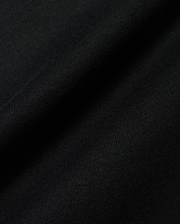 Premium black Kids Conan Back Graphic Tee, crafted from soft, finely ribbed jersey fabric, hinting at a bold back graphic for refined streetwear style.