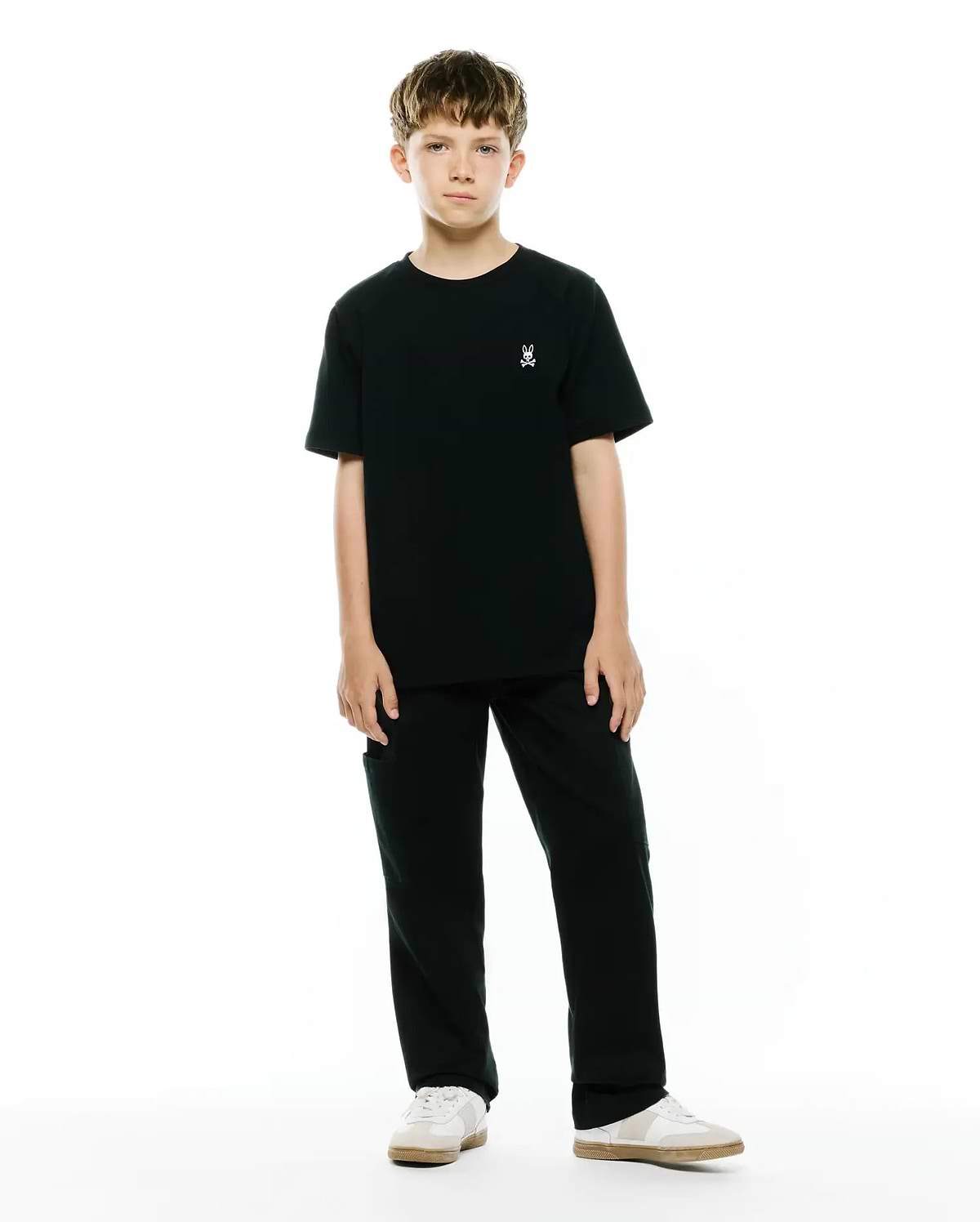 Kids Maxton Waffle Tee in black, a classic fit t-shirt with a subtle waffle texture, featuring a small white embroidered Psycho Bunny skull logo on the left chest. (4)