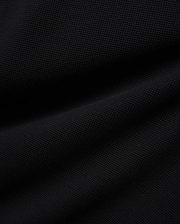 Premium Kids Maxton Waffle Tee in a deep black, featuring a distinct, soft waffle knit fabric texture with subtle raised squares and gentle folds, ensuring comfortable, refined style. (6)