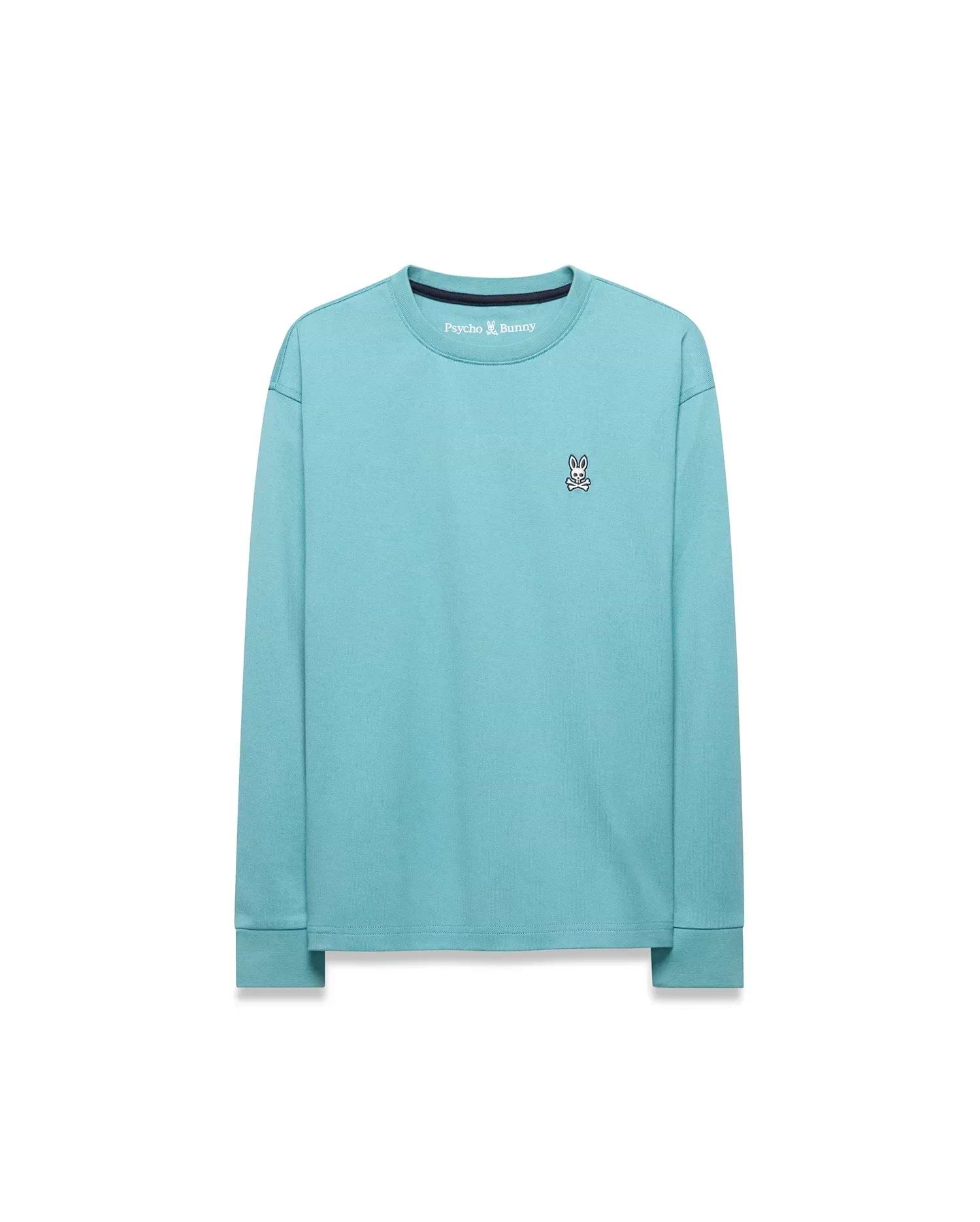 Kid's Norman Longsleeve Oversized Tee in aqua jersey, with a small embroidered white, black, and red Psycho Bunny skull logo on the left chest and a black ribbed collar. (5)