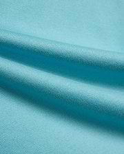 Kid's Norman Longsleeve Oversized Tee in vibrant aqua blue, showcasing its premium, finely woven cotton jersey knit fabric with soft, flowing drapes. (6)
