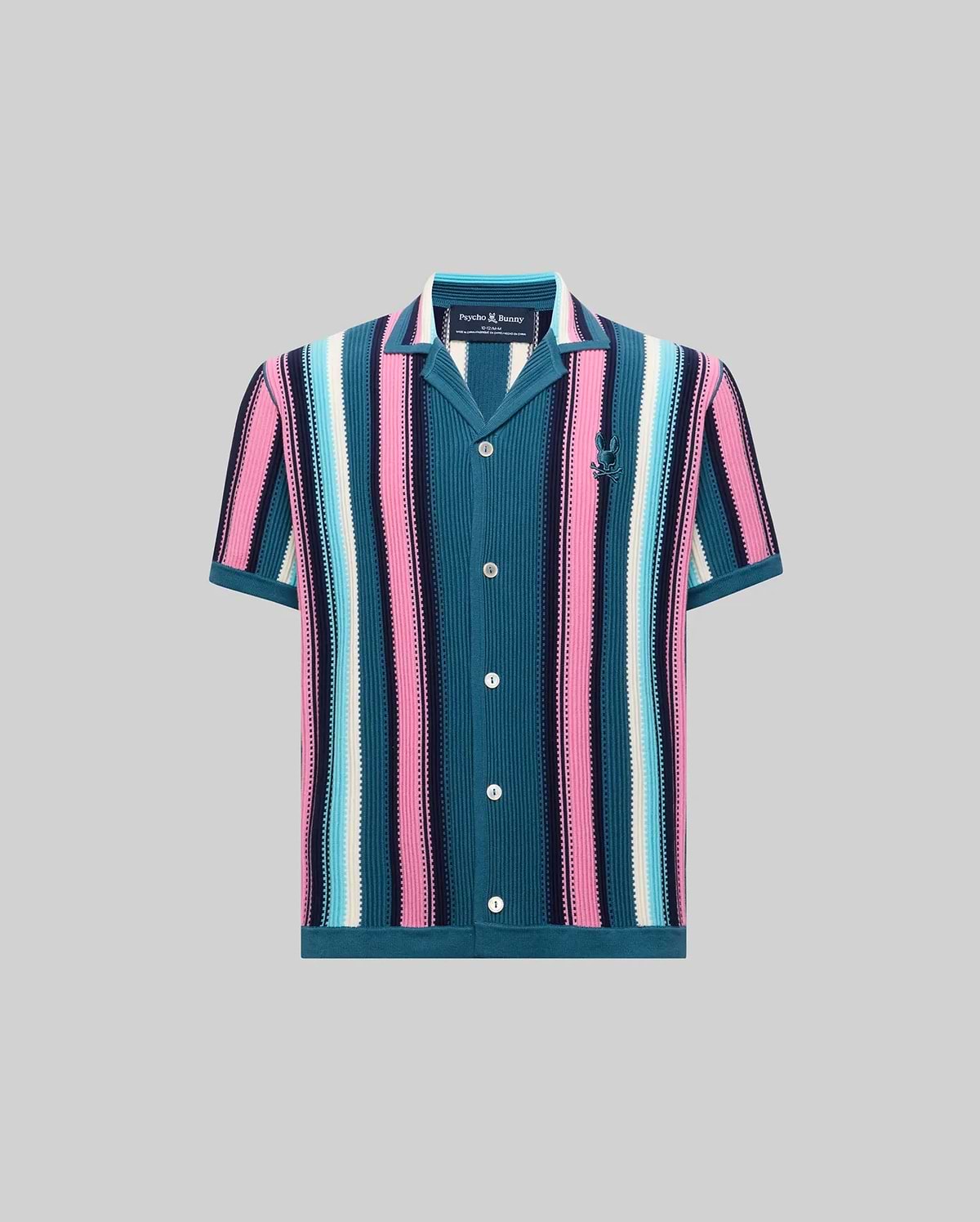 Kids Cliff Knit Shirt featuring bold vertical stripes in teal, pink, light blue, white, and navy, a camp collar, button-front, and a small embroidered Psycho Bunny skull logo on the left chest. (5)
