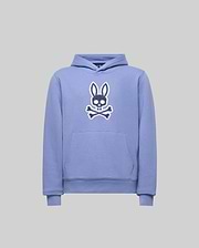 The Psycho Bunny KIDS RYDER EMBROIDERED BUNNY PATCH HOODIE (KT0500018) features a light purple color, front pocket, hood, and a large white and black embroidered bunny head above crossbones on the chest. Cozy style shown on gray background.