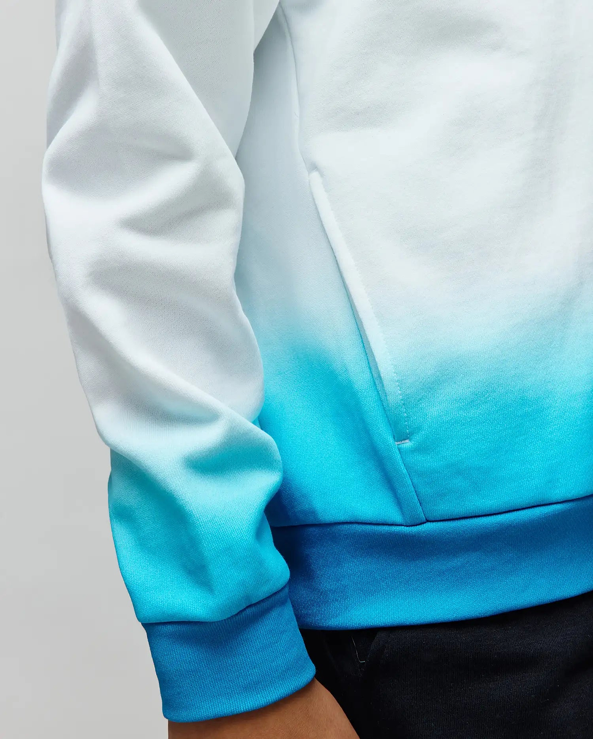 Kids Dax Oversized Hoodie in soft French terry, showcasing a striking white to turquoise and deep blue ombre gradient, with comfortable ribbed cuffs and hem.