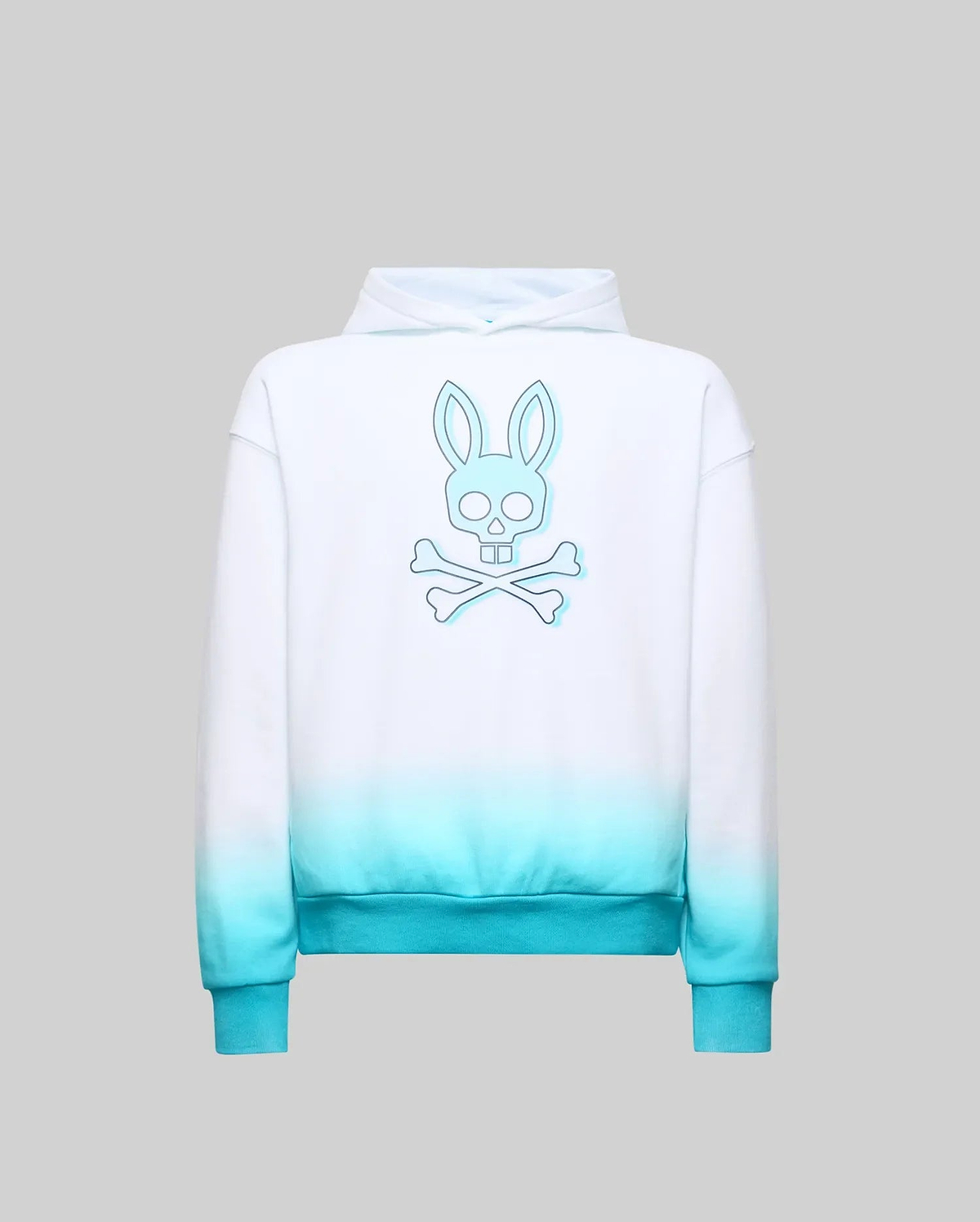 Kids Dax Oversized Hoodie in white French terry, featuring a turquoise ombre fade at the hem and a large light blue outlined Psycho Bunny skull logo with a subtle shadow on the back.
