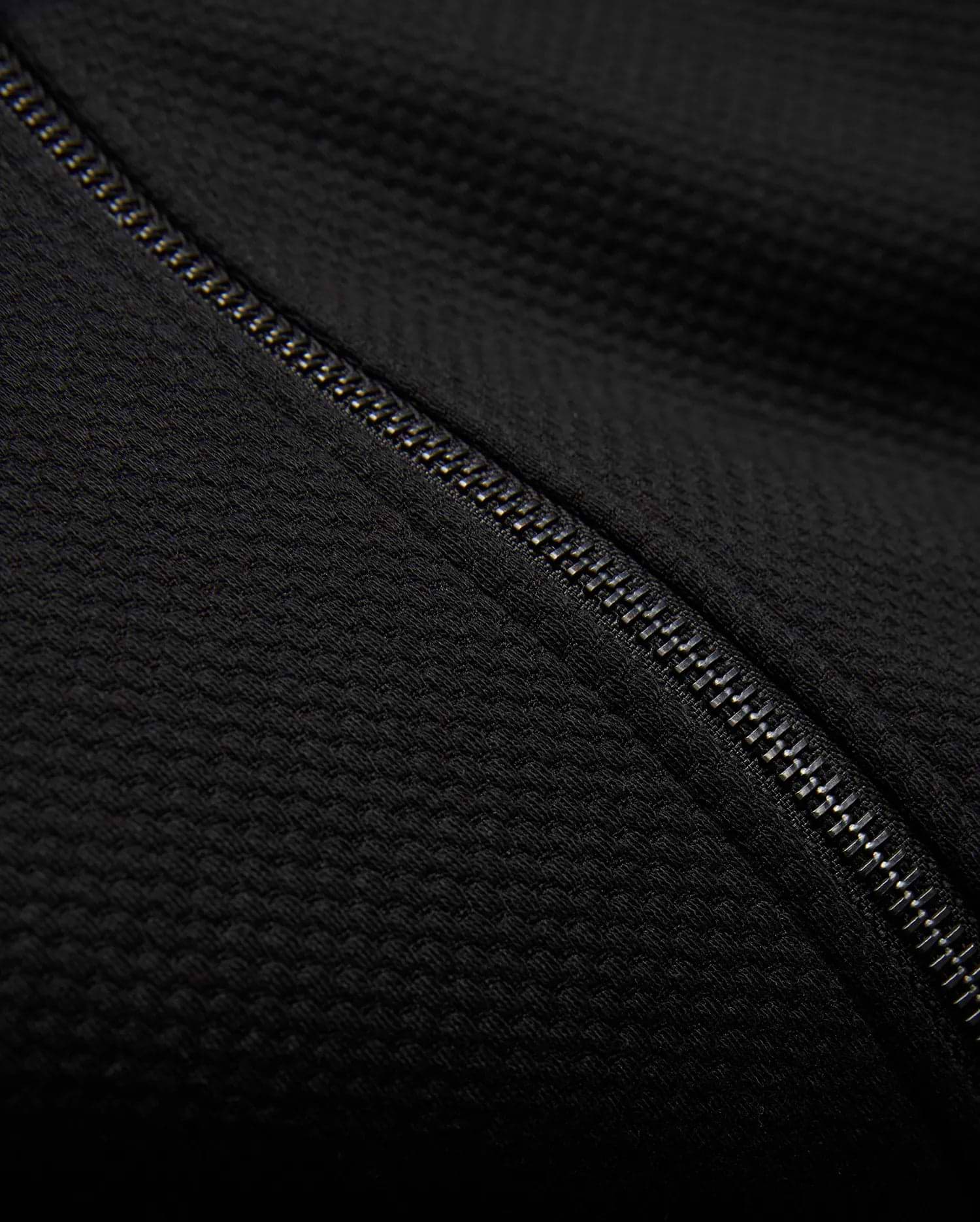 Kids Marc Textured Full Zip Hoodie in deep black, crafted from a refined textured knit fabric, featuring a prominent metallic silver full-zip closure.