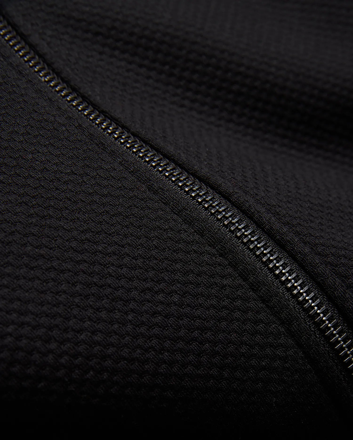Kids Marc Textured Full Zip Hoodie in deep black, crafted from a refined textured knit fabric, featuring a prominent metallic silver full-zip closure.