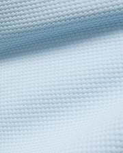 Kids Marc Textured Full Zip Hoodie in a soft light blue, featuring a distinct, all-over raised geometric knit texture, characteristic of premium Psycho Bunny streetwear.