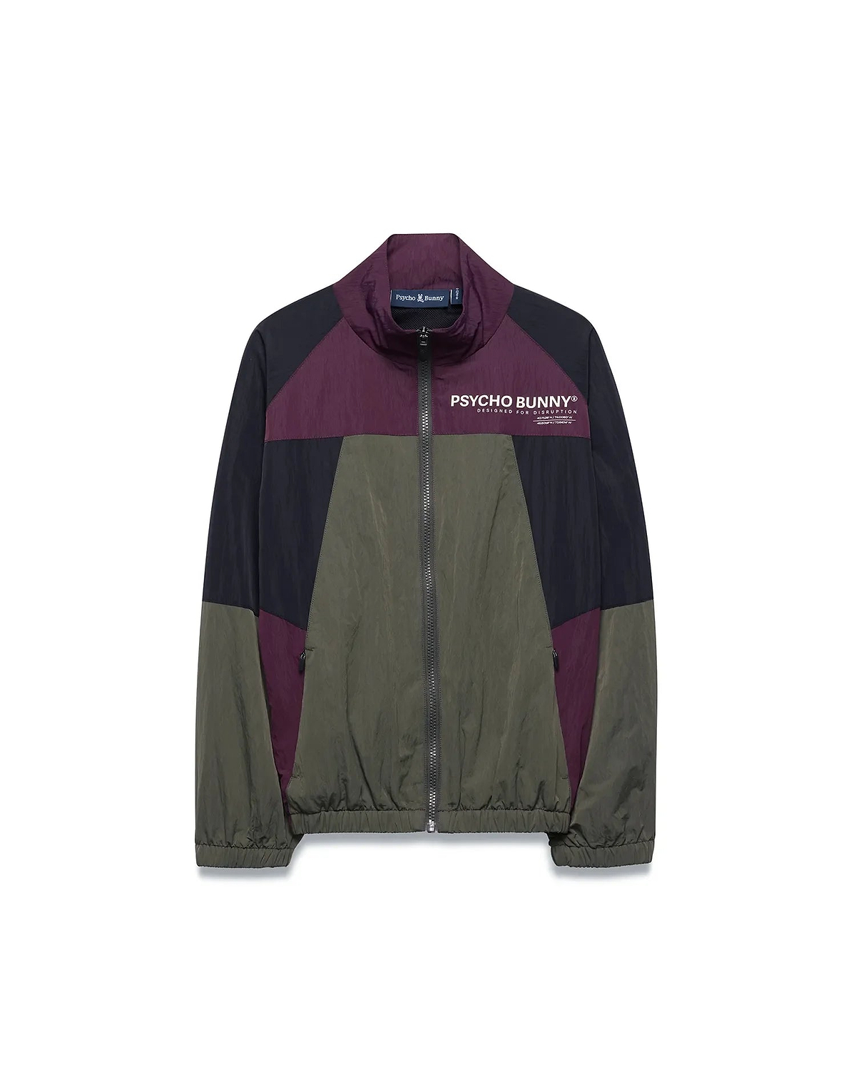 Kids Alder Nylon Colorblock Jacket in olive green, black, and deep purple, featuring a full zip, stand collar, and large white Psycho Bunny chest logo with Designed For Disruption text. Relaxed fit, crinkled nylon. (5)