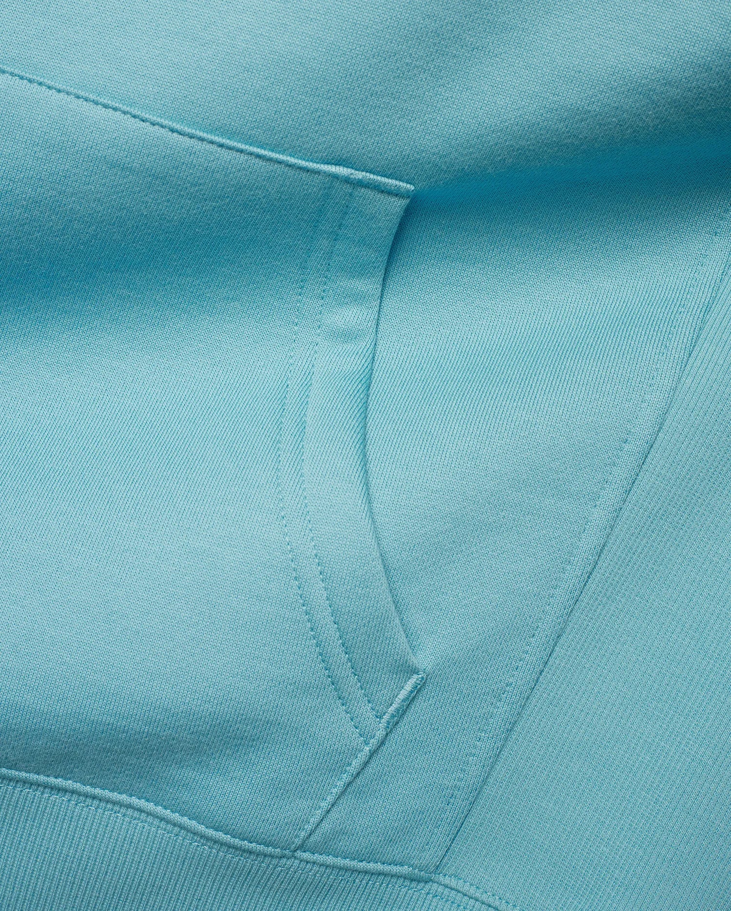 Kids' Terrence Fleece Hoodie in bright aqua, showcasing a soft, visible French terry knit texture, a spacious kangaroo pocket, and a finely ribbed hem for comfort. (2)