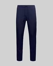 The Psycho Bunny MENS BEN TECH JOGGER PULL ON - MB0600013 features navy blue, soft polyester-spandex jogger pants with a drawstring waist, shown against a plain light gray background. (5)