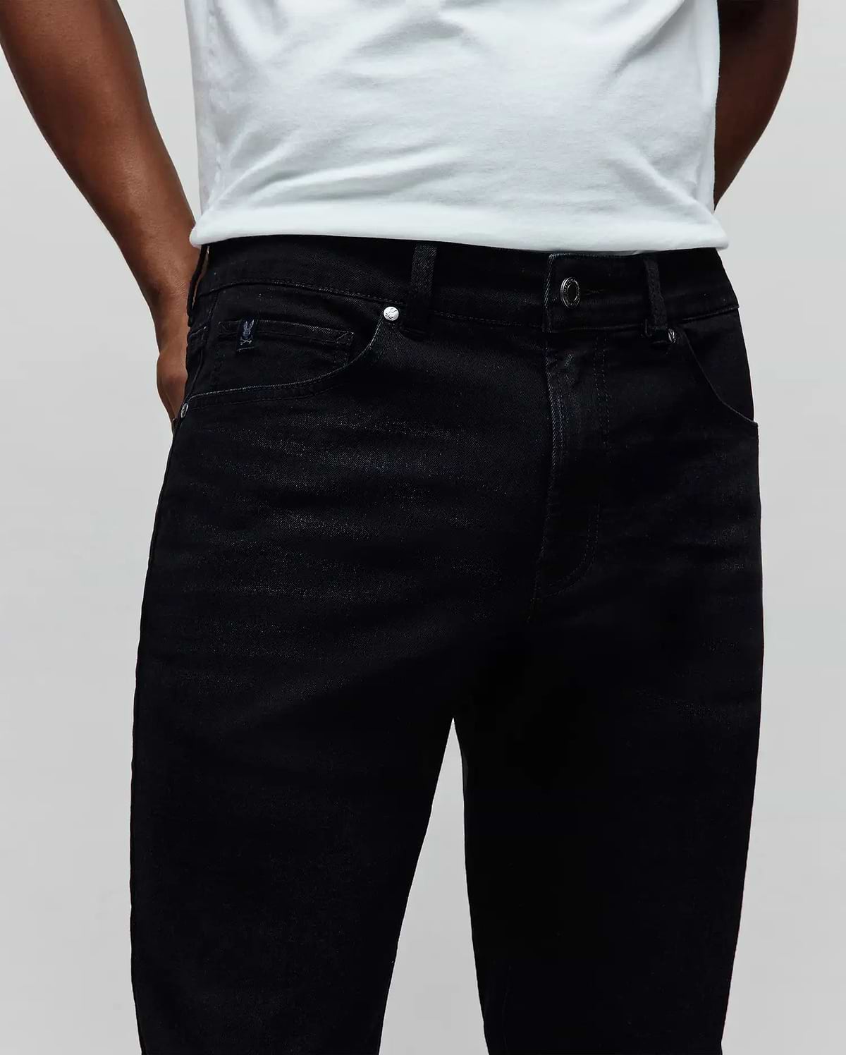 Mens Emerson Slim Fit Denim Pant in black denim, featuring a slim fit, small embroidered Psycho Bunny skull logo on the coin pocket, and silver branded hardware. (3)