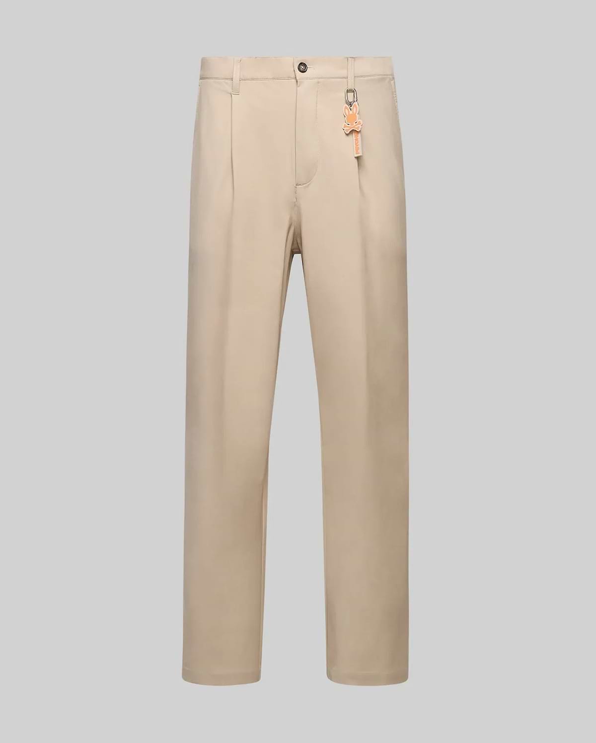 Beige Mens Malik Wide Leg Pant featuring a wide leg fit, subtle front pleats, smooth fabric, and an orange Psycho Bunny skull logo keychain attached to a belt loop. (5)