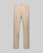Beige Mens Malik Wide Leg Pant featuring a wide leg fit, subtle front pleats, smooth fabric, and an orange Psycho Bunny skull logo keychain attached to a belt loop. (5)