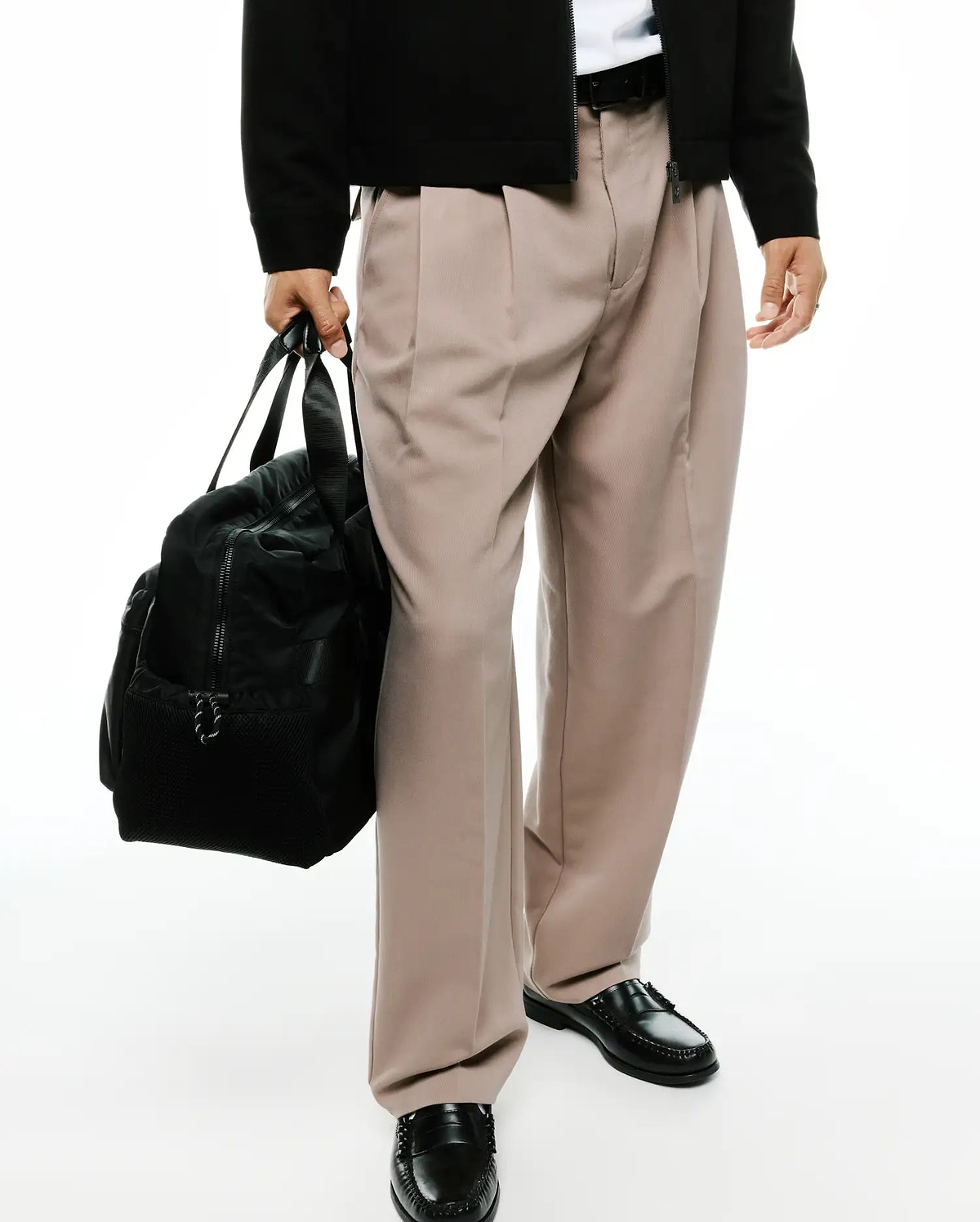 Men's Wayde Wide-Leg Pleated Pants in a smooth light beige fabric, featuring a relaxed wide-leg fit and prominent front pleats for a stylish streetwear look. (4)