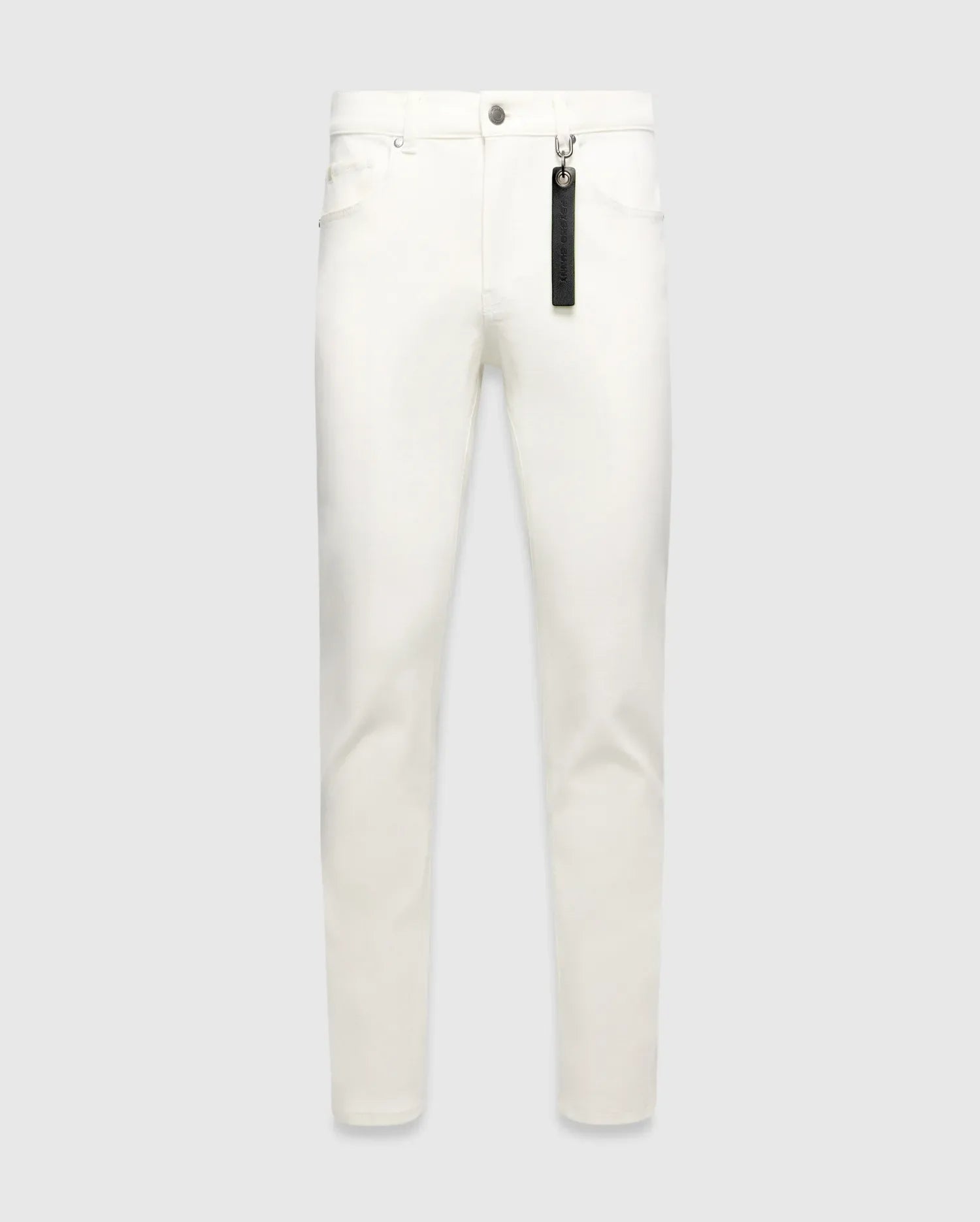 Mens Emerson Denim Pant, white slim-fit denim with silver hardware and a black Psycho Bunny branded tag hanging from a front belt loop.